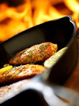 frying meat in a pan