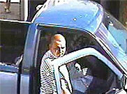 image of man stealing a vehicle