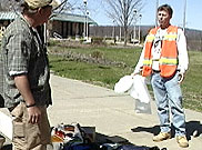 image of NYSDOT worker greeting and having dialogue with suspicious person