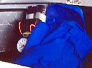 image of a device with a timer and wires sticking out of a duffle bag