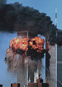 photo of September 11 terrorist attack with explosions and burning buildings with hugh smoke plumb