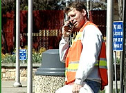 image of NYSDOT worker notifying proper authorities about suspicious person